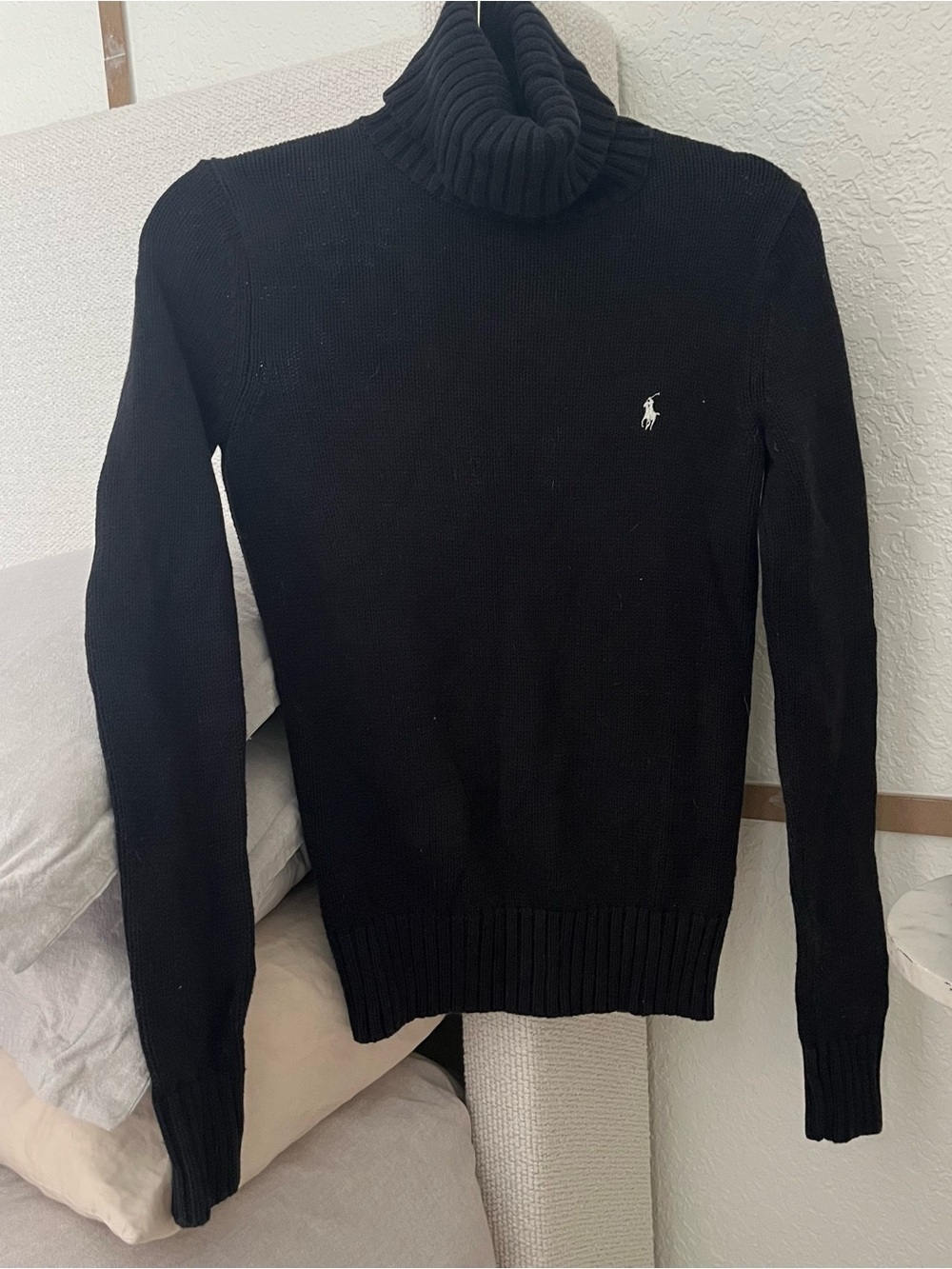 Classic Ralph Lauren women’s turtleneck sweater in black.
